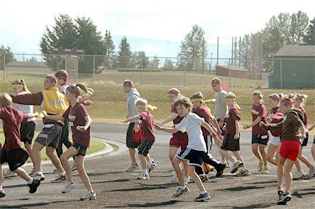 Campers warmed up with crossover sidestep before serious competition began.