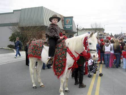A child sits on a decorated horse during the 2008 Hometown Holiday parade.