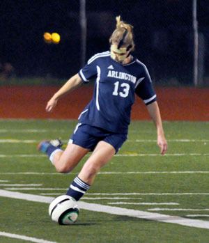 Arlingtonâ€™s Madi Grogan moves the ball upfield during the Oct. 15 match against Edmonds-Woodway.