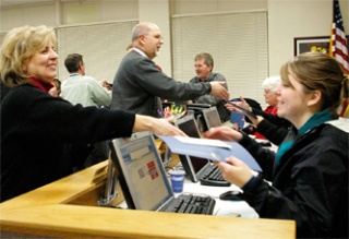 Arlington School District’s Financial Services Director Deb Borgens presents student advisor Nikki Doggett with her Certificate of Appreciation when Superintendent Kristine McDuffy and her Leadership Team members