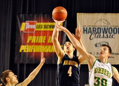 Arlington’s Terry Dawn shoots a field goal during the Feb. 28 state quarterfinal game against the Richland Bombers at the Tacoma Dome.