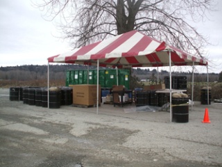 The flood debris collection site behind Patty's Egg Nest Restaurant in Island Crossing