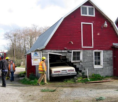 An Oso man lost control of his vehicle and crashed into a dairy barn on Thursday