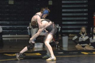 Arlingtons Kellen Haynes put up a furious struggle Jan. 9 against Lake Stevens Jack Stilwell but could not prevent a technical fall decision.