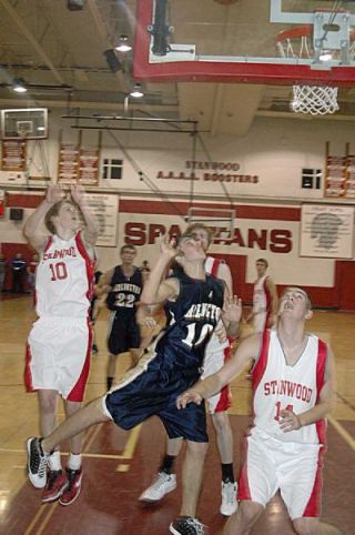Hustle plays like this one from guard Will Heath made the difference for the Arlington Eagles boys basketball team in their 70-68 overtime triumph against rival Stanwood on Jan. 25.