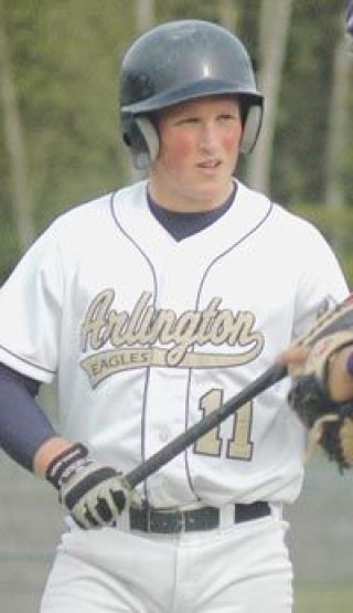 Arlington senior outfielder Spencer Southy questions a call with the home plate umpire Wednesday