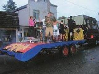 The Junior Class float of the Arlington High School Homecoming parade evoked memories of the Happy Days when rock-and-roll was still new