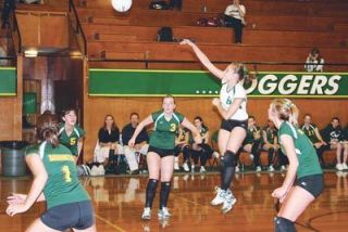 Kimi Woodward thunders down a midcourt spike for the Darrington girls volleyball team in their win over Mt. Vernon Christian.