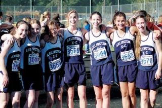 The Arlington girls cross country team qualified for state at districts at South Whidbey. From left