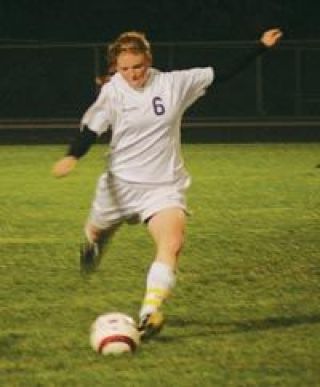 Senior defender Samantha Sam Welch prepares to fire a shot against M-P Tuesday