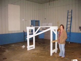 Tasha Branch offers a tour of the old dairy barn at the former Country Charm Dairy where a Monte Carlo Night of gambling with live and silent auctions set for Saturday