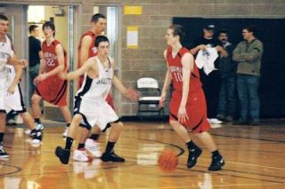 A.J. Richardson slides on defense for the Eagles. Richardson helped keep the Eagles in a tight ballgame in the first half