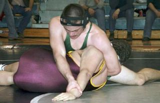 Darringtons Mathias Metzger at 215 pounds pinned South Bends Nick Rowe to place third at the Westside Regional wrestling tournament.