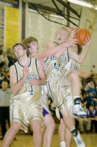 AHS senior guard and forward Andrew Disotell powers to the basket in Wesco North action Tuesday