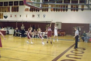 Jeneca Hoidal drills a 3-pointer from the left corner during the first half of Lakewoods 42-37 victory over Cedarcrest.