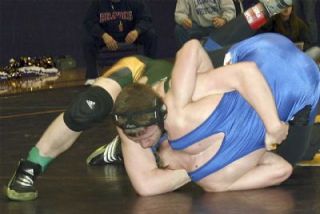 Paden Newberry of Darrington pins Matt Burlingame of La Conner in the championship match of the 160 pound District 1A/2B playoffs.