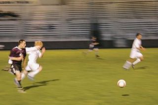 The onrushing Arlington defense fought through a bruising game.