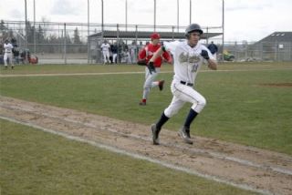 Senior Caleb Scarth sprints for first.