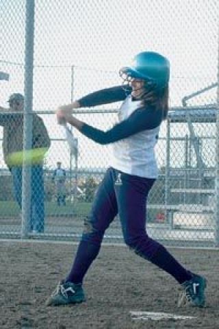 Kristen Allen puts the good part of the bat on the ball