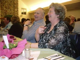 Roy and Darlene Strotz show their support for the dairy industry by attending the Snohomish County Dairy Ambassador Coronation held at the Stanwood-Camano Senior Center April 19.