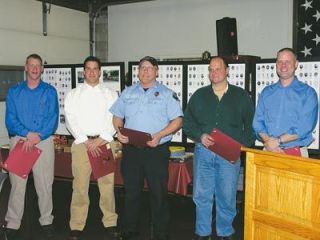 Among the Arlington Fire Department members present to receive their 10-year service certificates were