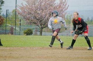 Lakewood shortstop Kahlee Barrio steals home in the fifth inning.