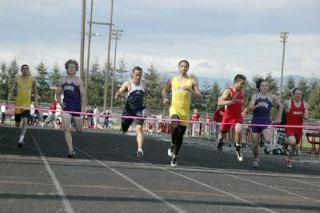 Senior sprinter Bryan Mack competes in the 100 at Marysville where he took second in a time of 11.24 to Mariners Marzell Jenkins