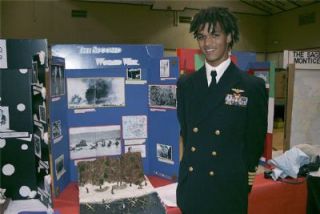 Lucas Revelle displays his project on World War II