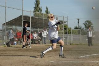 Slackers leadoff hitter Faun Birch is poised for a hit early in the fifth inning.