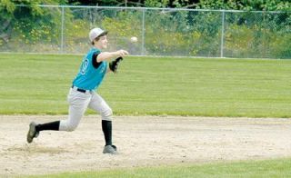 Garth Rose makes a throw from shortstop to first base.  Rose finished 3-4 with a double and two RBI in game one of the Rapids doubleheader.
