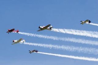 Airplanes flying in unison through the blue sky this week will most likely be participants in the Arlington Fly-Ins daily air show
