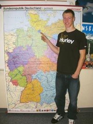 Stillaguamish Valley School Class of 2007 graduate Alex Oczkewicz points to Hamburg