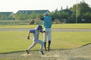 Jon Brown makes a terrific tag at first base