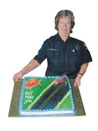 Darlene Strotz with her cake during her retirement party.