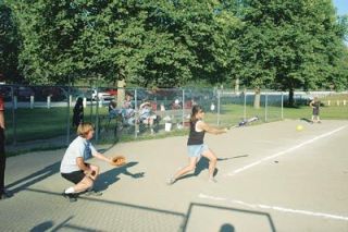 Julie Baker gets around on this pitch in the first inning of Arlington Pharmacys match-up with Roads West.