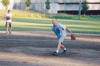 Bruce Brekhus with the wind up and the pitch.  Brekhus conceded four home runs but still got the win as pitcher for Roads West.