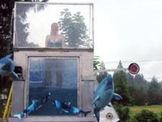 Taylor Nisonder braves the cool weather to get dunked.