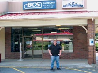 Mike DeLuca stands in front of BCS Computer in Smokey Point.