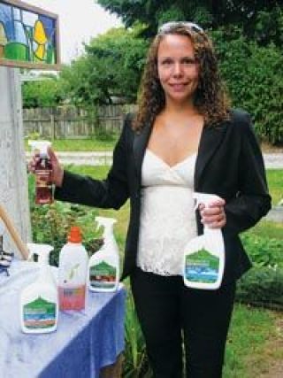 Angie Drake shows off some of the environmentally conscious cleaning products she uses as part of her Eco-Cleaning housecleaning services.