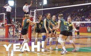 Darrington Loggers win another point during the 2001 state championships at the Spokane Arena. From left are Harmony Perrault