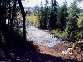 The new section of SR 9 north of Arlington will go up through the ravine which is parallel to the current road commonly known as Suicide Hill. Before the ravine