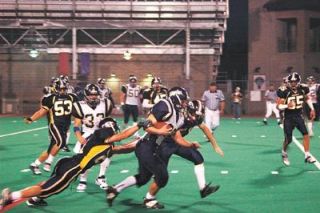 Everett struggled to bring down senior running back Brad McPherson on this run