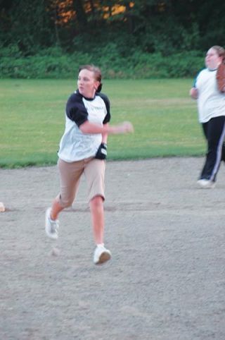 Abby Westphal rounds second and heads to third as part of her huge night at the plate.