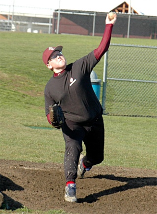 Lakewood freshman Brayden Burbee practices pitching early in the season.