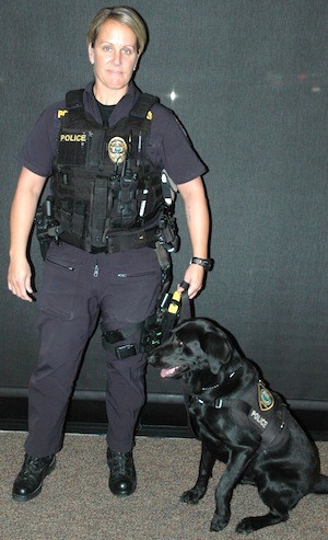 Arlington K-9 Officer Molly Ingram presents her new partner