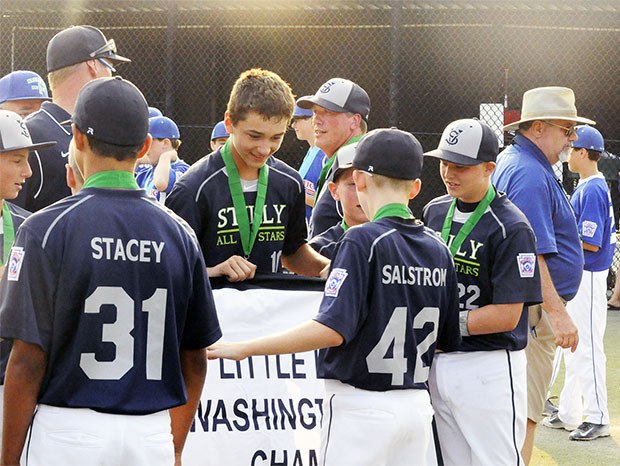 The Stilly Valley All-Stars receive their District 1 Championship banner July 8.