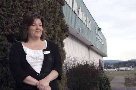 Stillaguamish Athletic Club manager Carla Gastineau will be one of many Smokey Point businesses affected by a new Walmart being erected near 172nd Street NE.