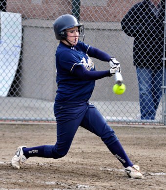 Lyndsay Turner connects for a two-run single in the first inning.