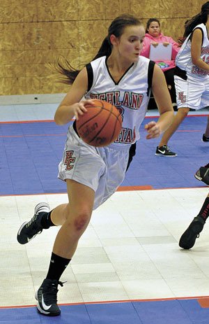 Highland Christian senior Esther Brown drives to the basket during her team’s Jan. 14 loss to Tulalip Heritage.