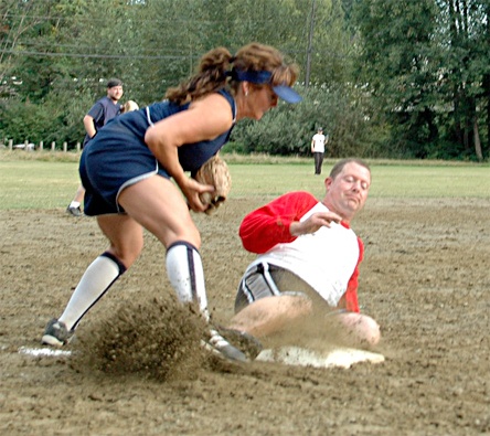 Universal Aerospace third baseman Andrea Pettit tags out Kirk Roberts